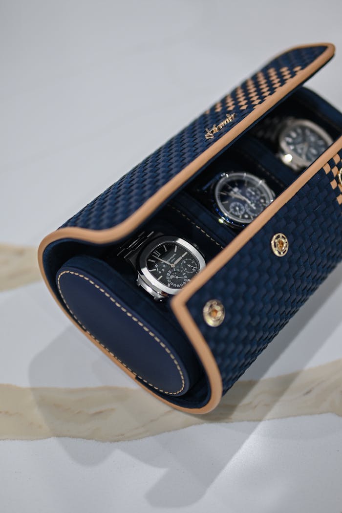 Menus Luxurious watches in an elegant blue and gold case, showcasing style and wealth.