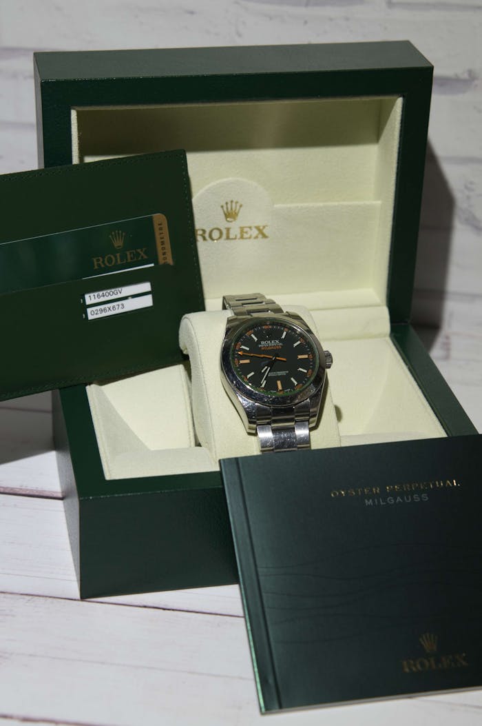 About Elegant stainless steel watch showcased in original packaging with documents.